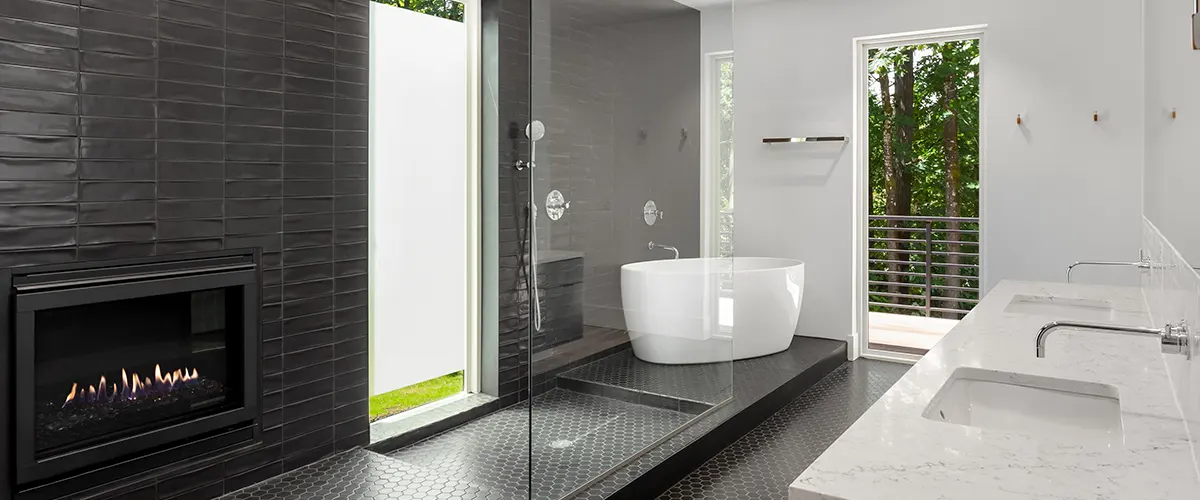 Modern bathroom in black and white tiling with walk-in shower