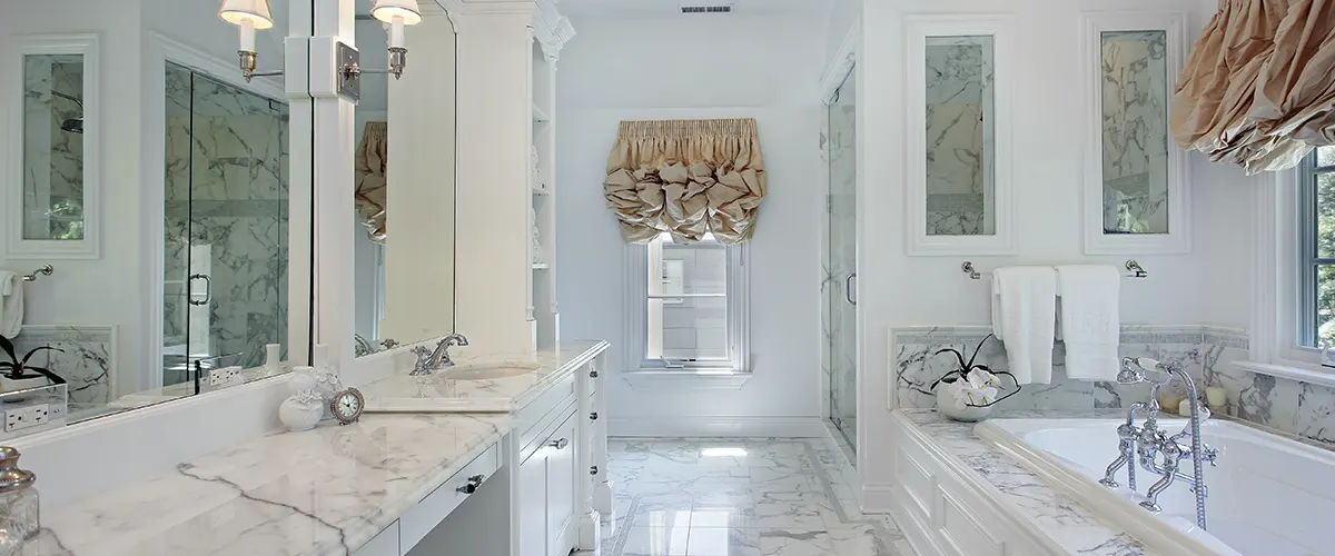 An elegant bathroom with marble countertop