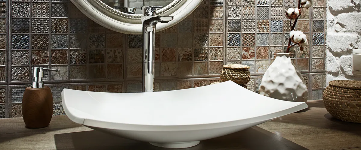 A cool sink with decorative tiling