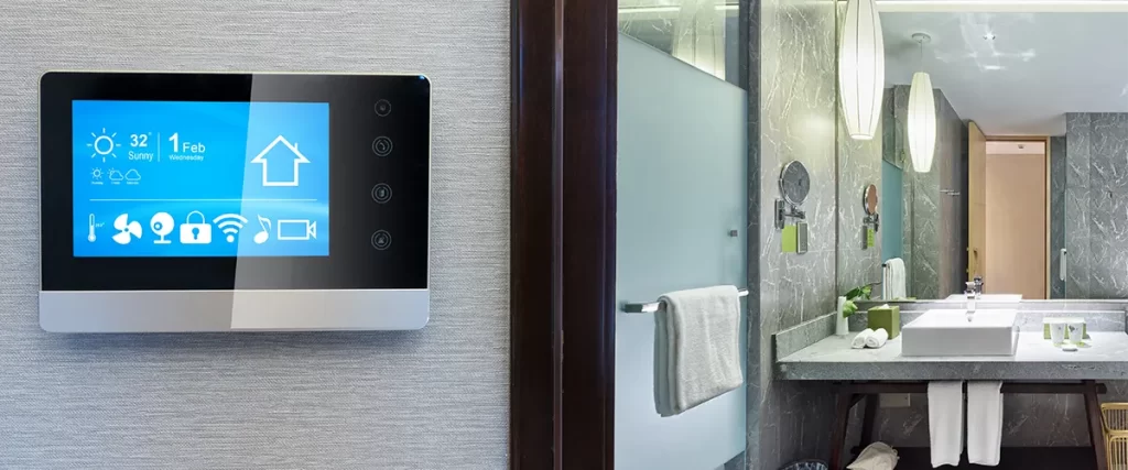 A smart gadget on the wall of a master bathroom