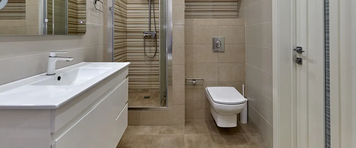 A basement bathroom with a walk-in shower