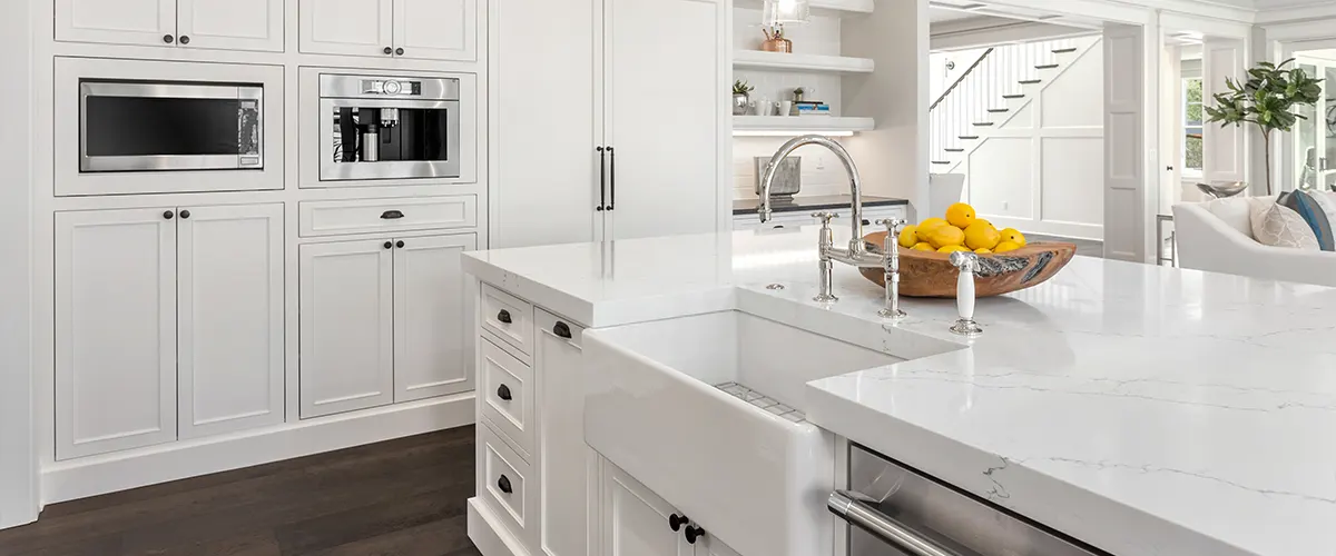 White kitchen remodeling with apron style sink and custom cabinets in Overland Park, Johnson County