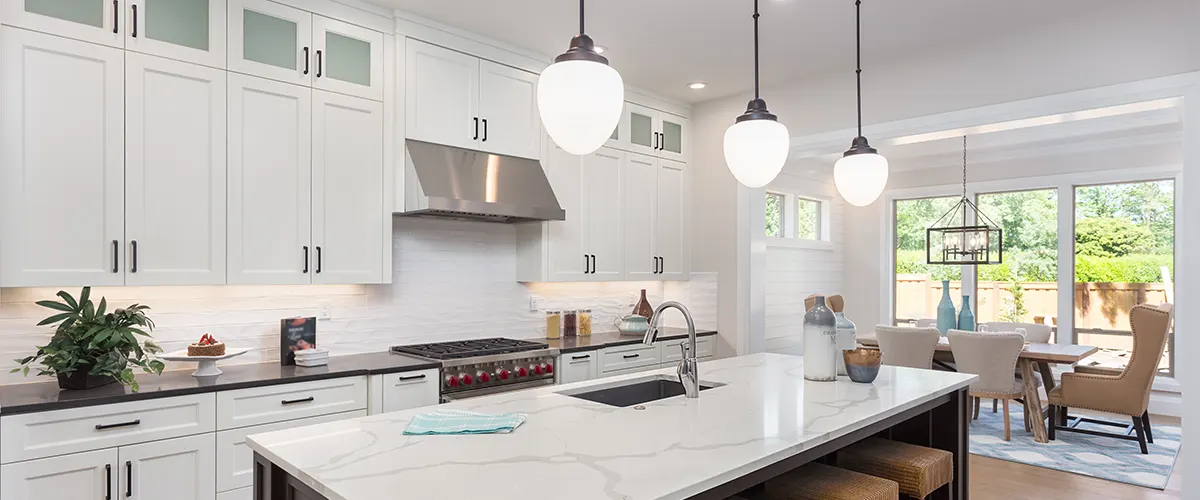 Pendant lights in a kitchen with quartz countertop