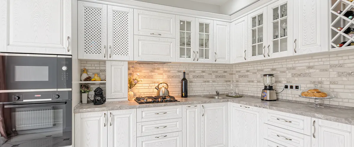 Transitional cabinets with gray appliances
