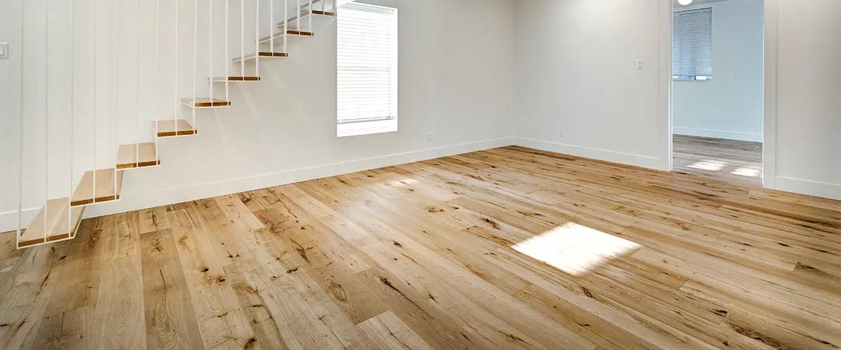 Engineered wood flooring in an empty basement