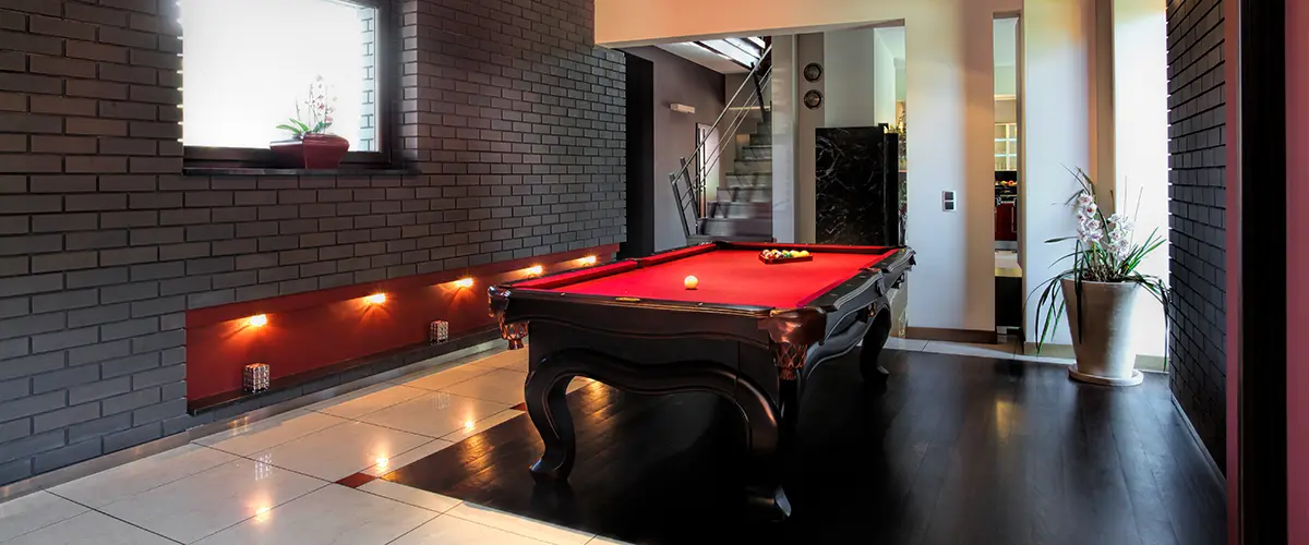 A basement with a pool table