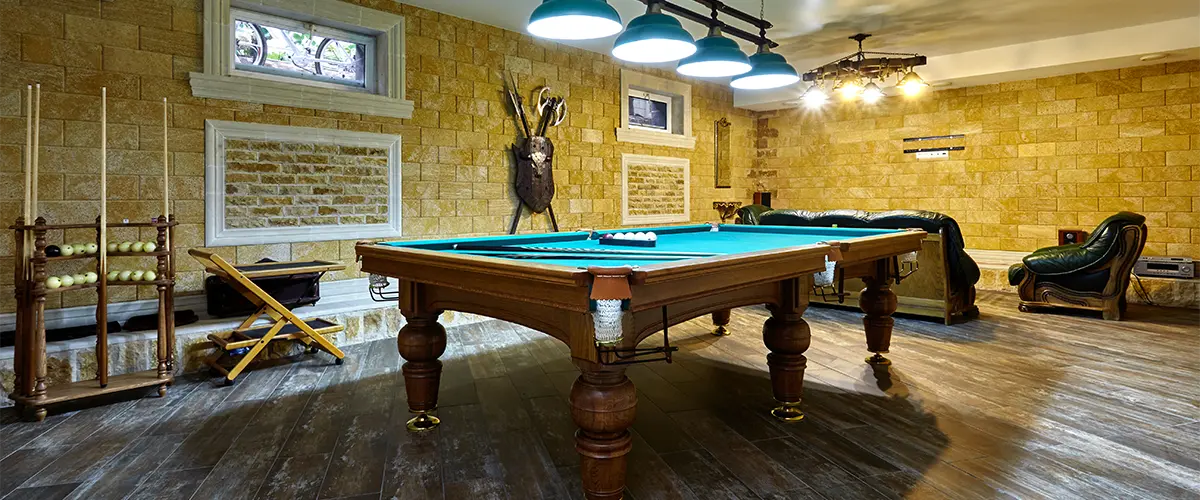 A pool table in basement