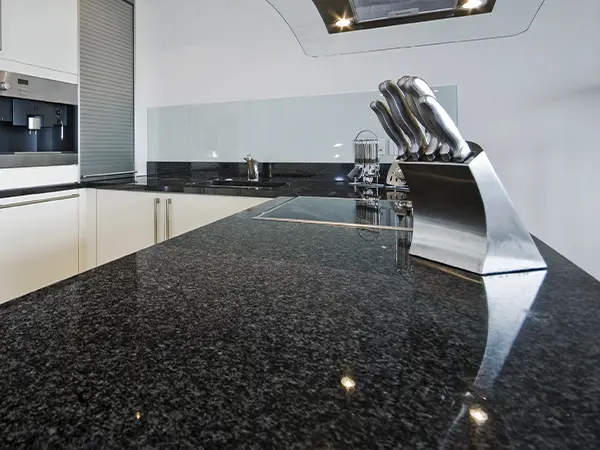 Granite countertop with a set of knives