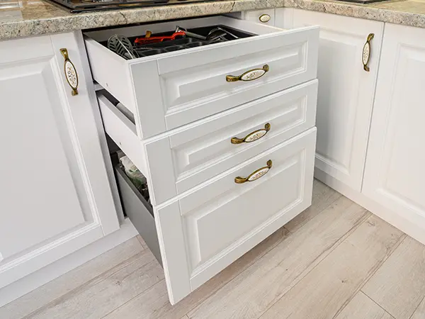 Kitchen cabinets with golden pulls