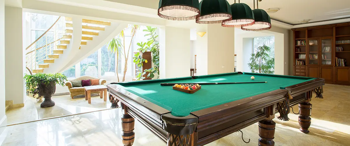 Pool table in walk-out basement