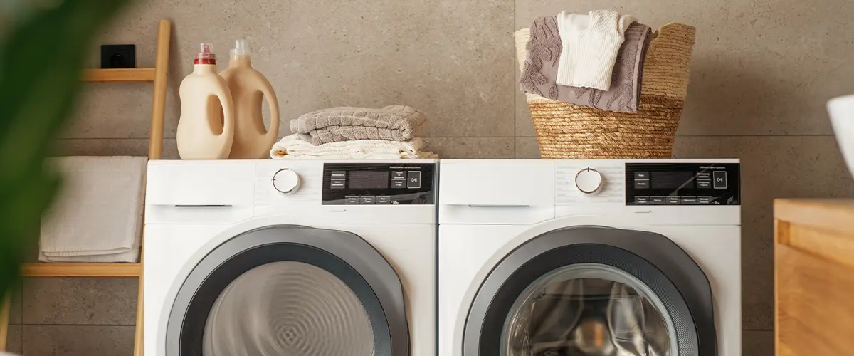 A laundry room with two washers
