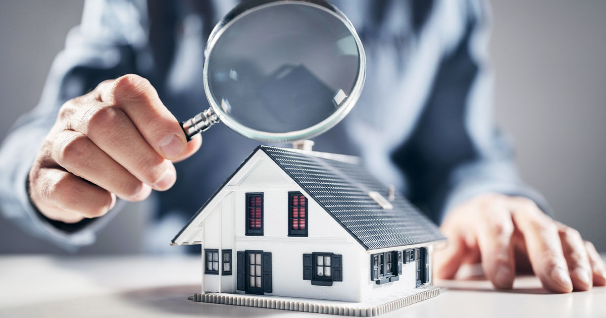 Magnifying Glass Over House For Home Inspection